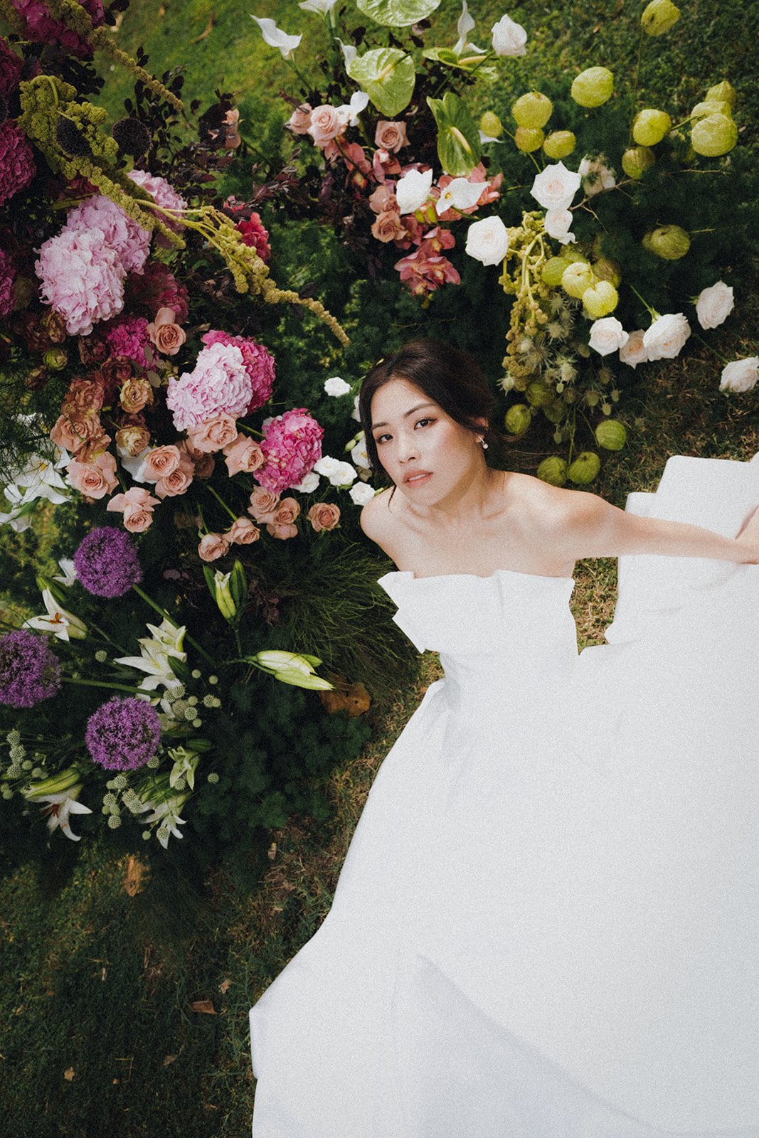 Bride wearing wedding gown Selene in a Singapore bridal styled shoot with botanical florals